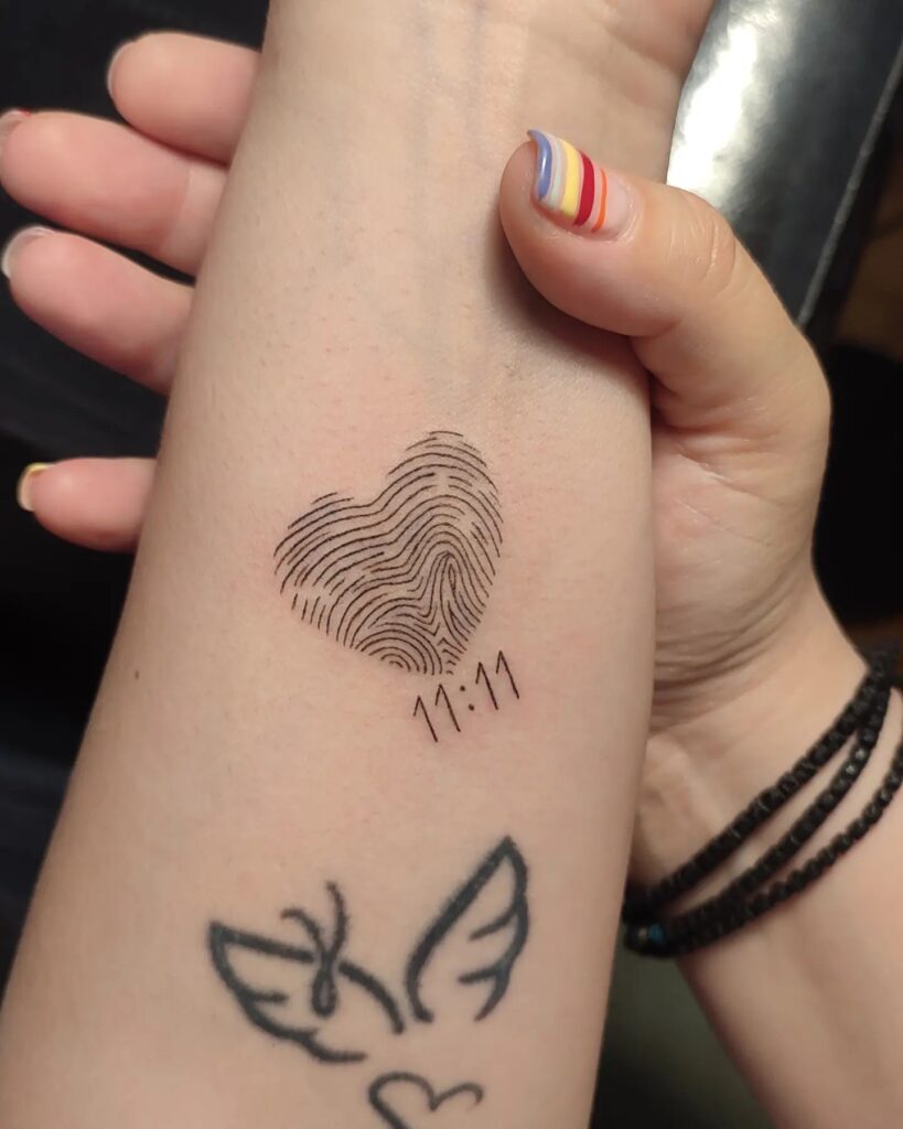 Single Fingerprint Tattoo with Name fingerprint tattoos tattoo