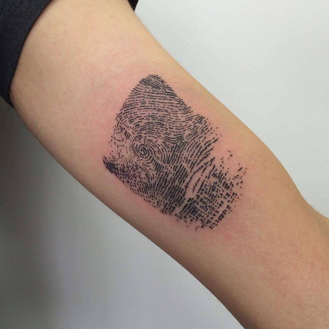 Fingerprint Wolf Tattoo
