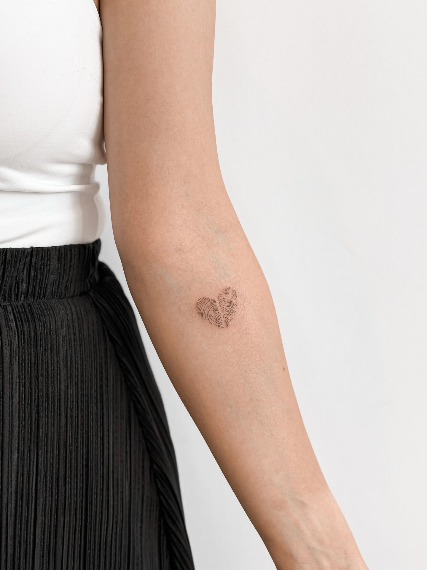 Minimalist Fingerprint Heart Tattoo