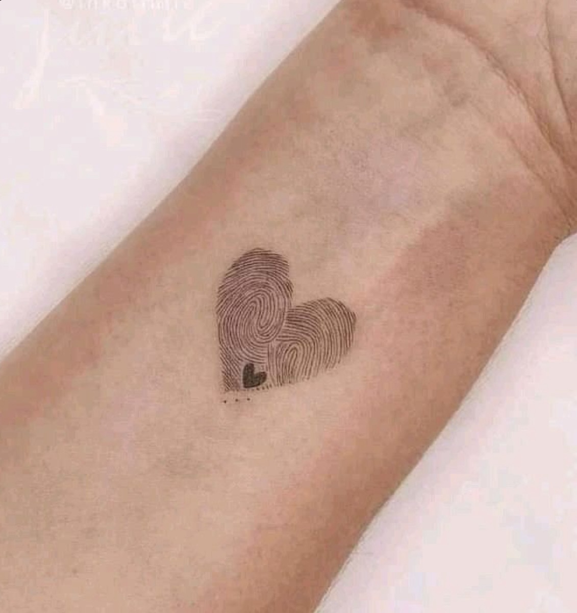 Overlapping Fingerprint Heart Tattoo