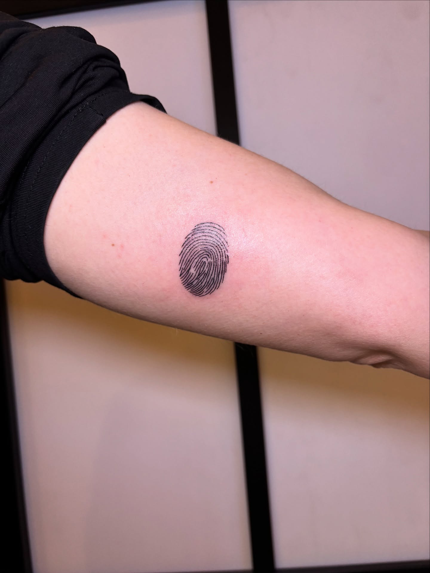 Simple Fingerprint Tattoo