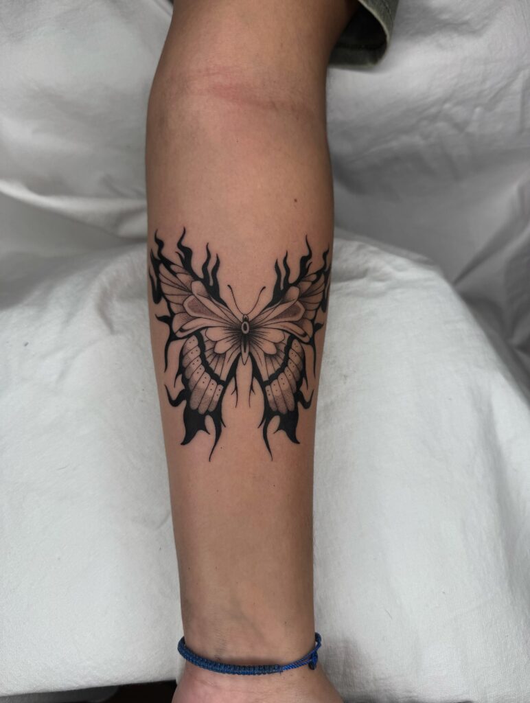 Flame-Inspired Butterfly Tattoo butterfly tattoo designs tattoo