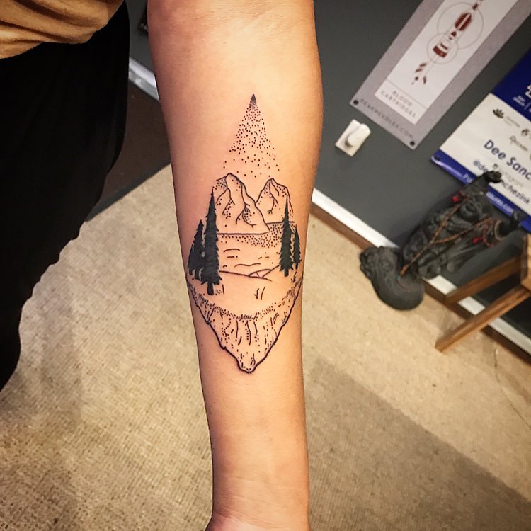Floating Minimalist Alpine Peaks nature scene tattoo