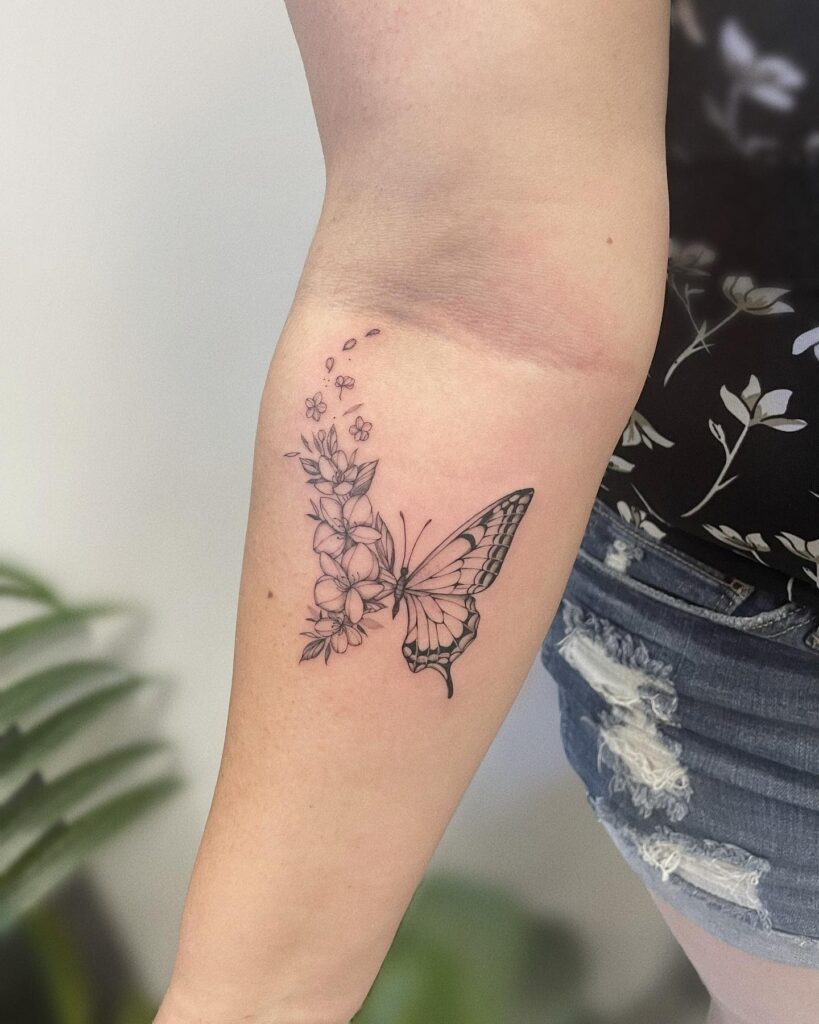 Floating Petals and Butterfly Wing Tattoo half butterfly half flower tattoos tattoo
