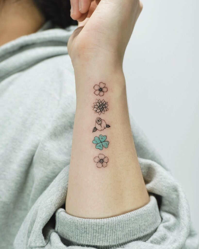 Watercolor Cherry Blossom Wrist Tattoo