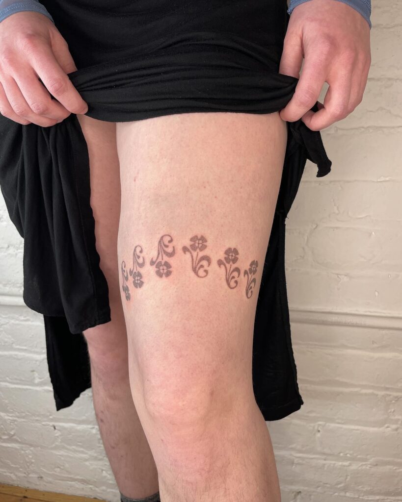 Bold Matching Daisy Wrist Tattoos