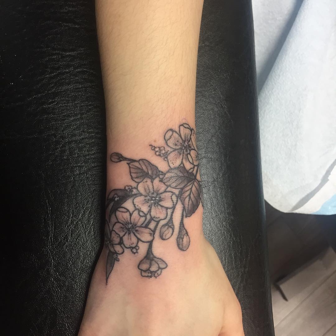 Floral Branch Wrist Tattoo