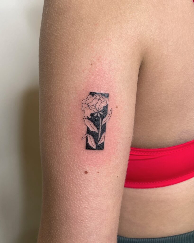 Floral Contrast Arm Tattoo