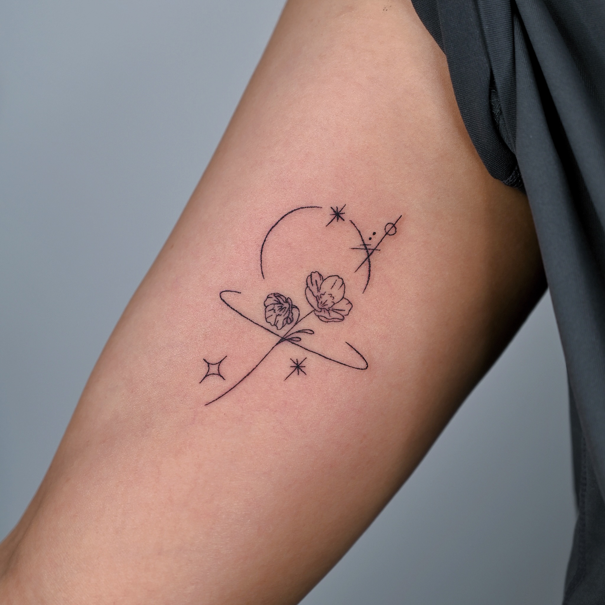 Floral Cosmic Fine Line Tattoo fine line tattoo ideas with meaning tattoo
