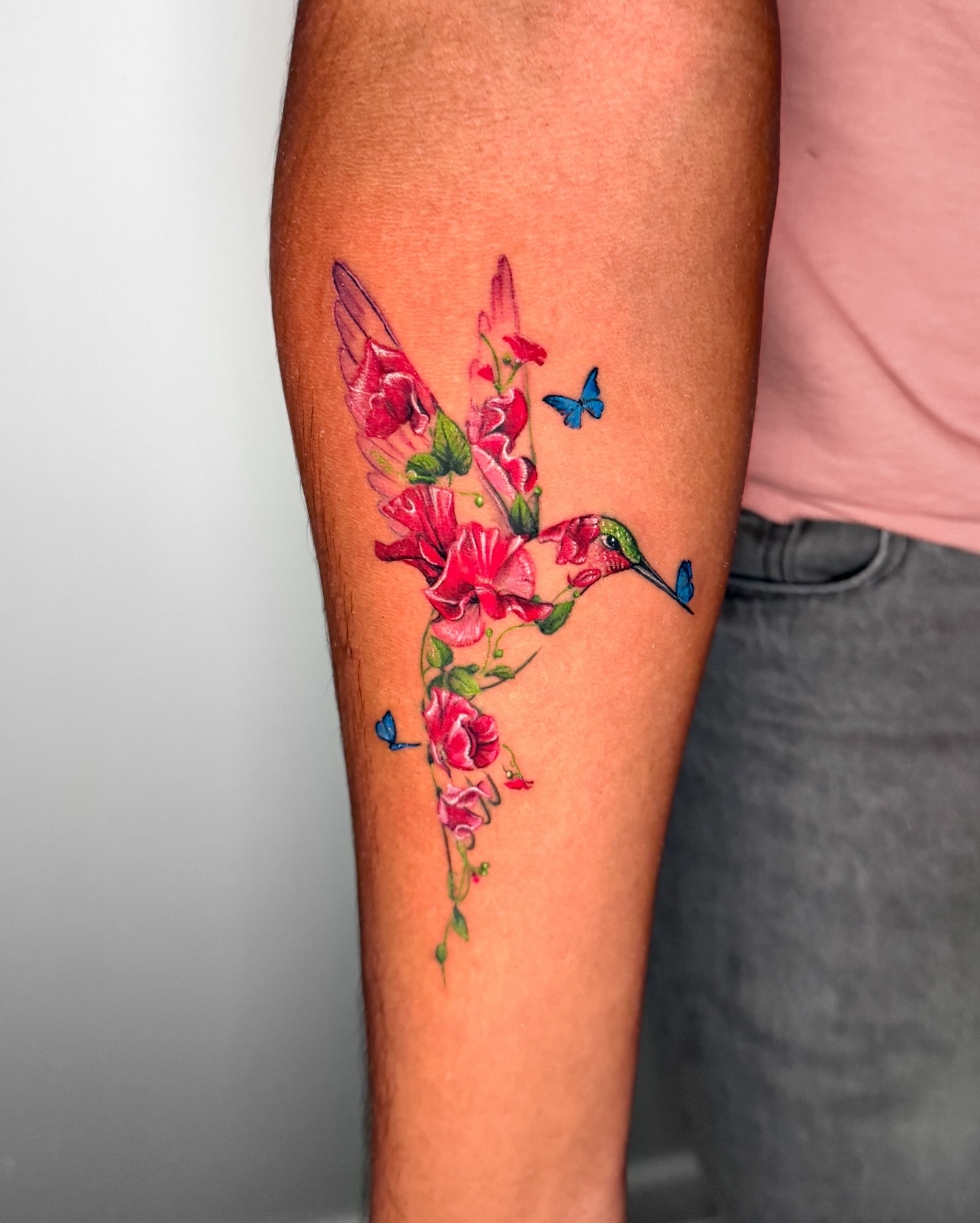 Floral Hummingbird Silhouette Tattoo with Butterflies hummingbird tattoos ideas tattoo