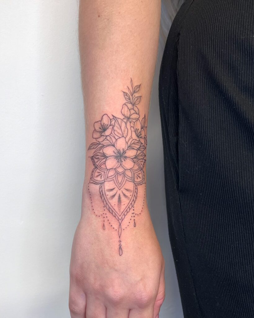 Phoenix Wrist Tattoo