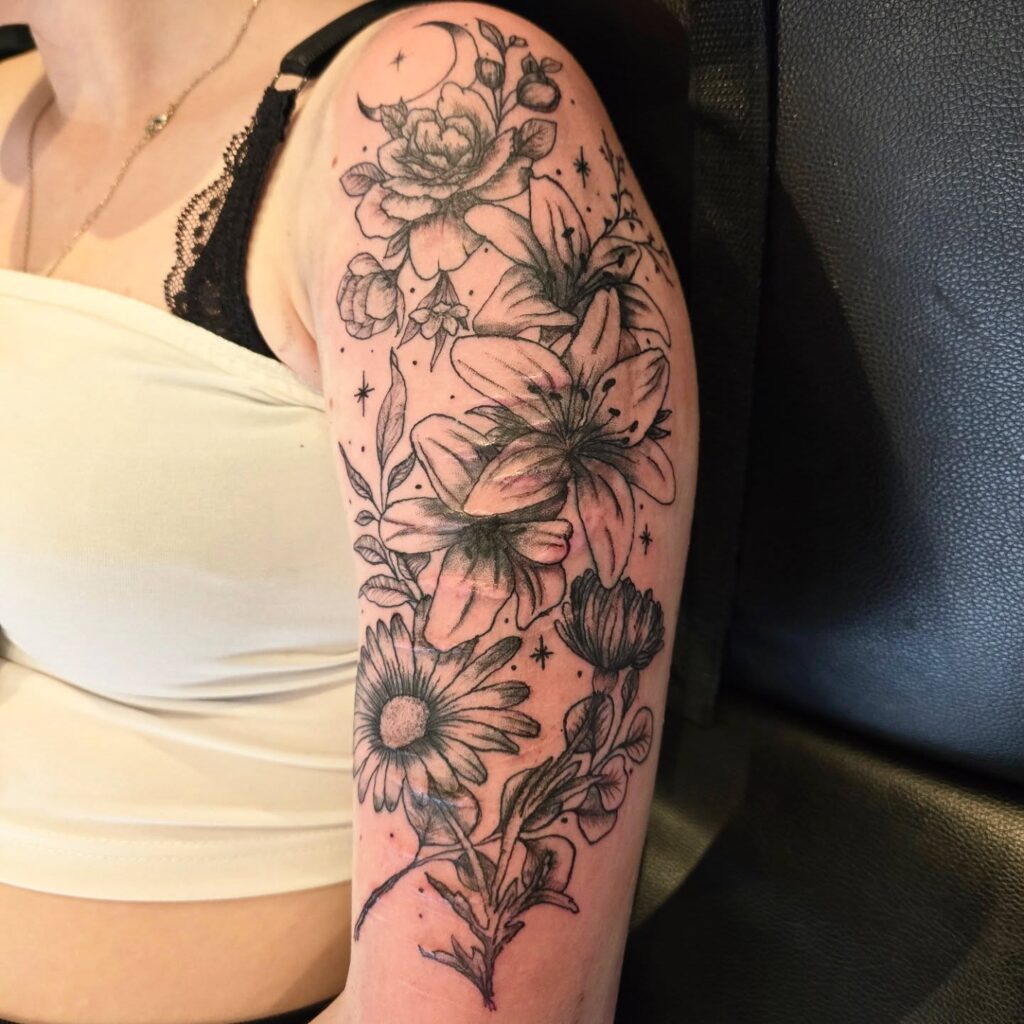 Medusa-Inspired Half Sleeve Tattoo With Serpent And Woman S Portrait