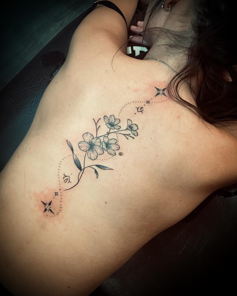 Mystical Symbolic Spine Tattoo