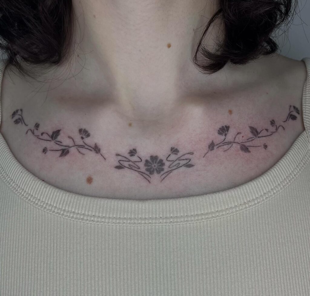 Floral Daisy And Violet Collarbone Tattoo