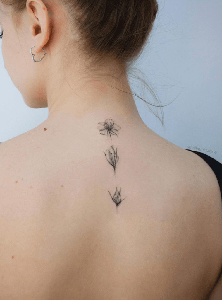 Flower Blooming Back Tattoo