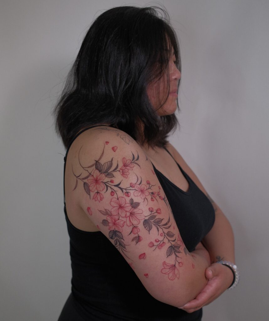 Flowing Cherry Blossoms Sleeve Tattoo cherry blossom tattoo ideas tattoo