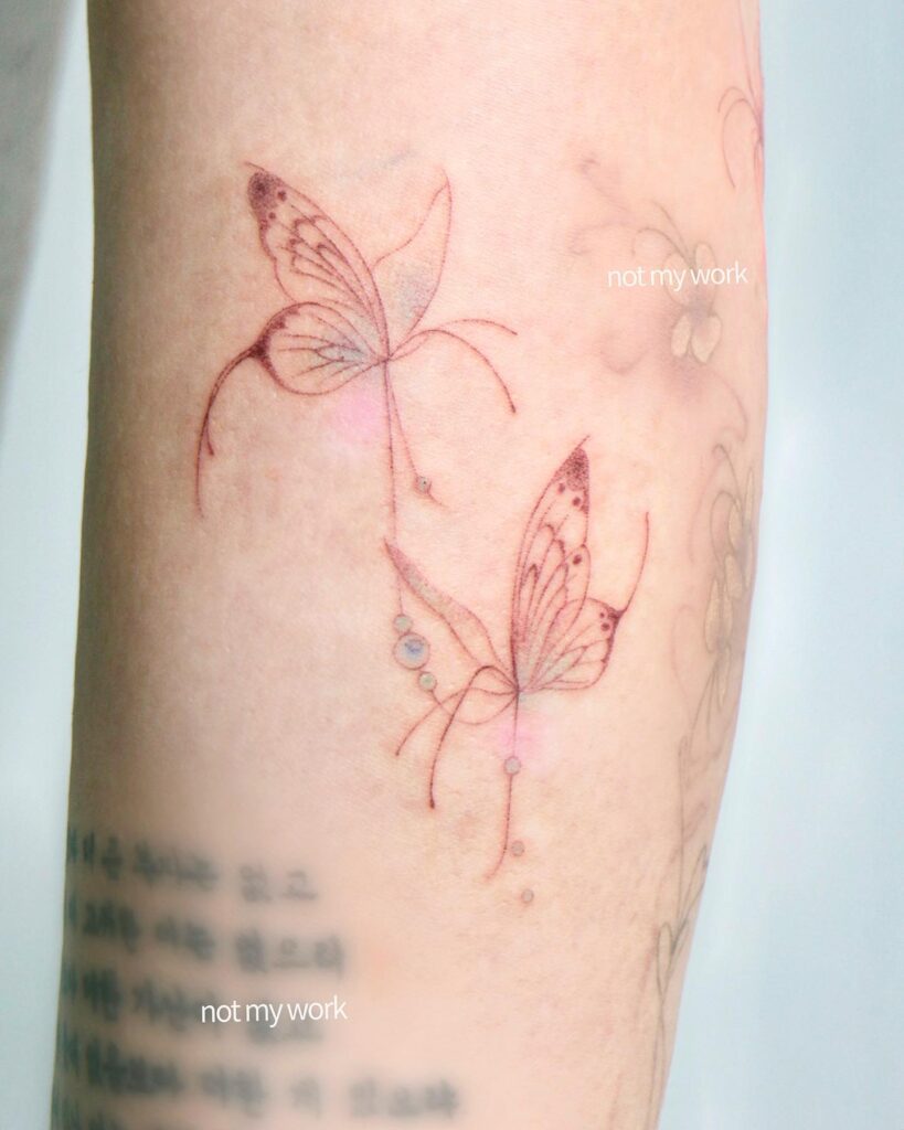 Flowing Fine Line Butterfly Pair butterfly tattoo