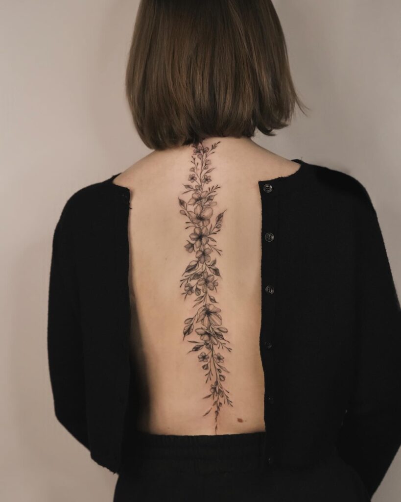 Elegant Script Spine Tattoo
