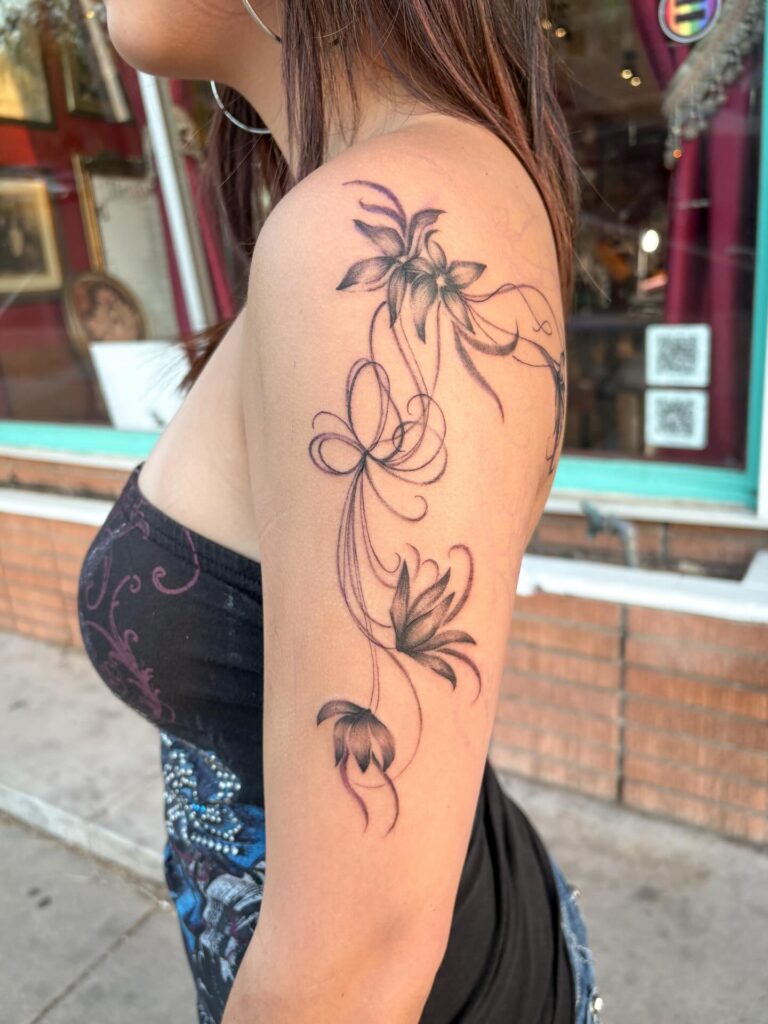 Flowing Floral Shoulder and Arm Tattoo fine line tattoos for women tattoo