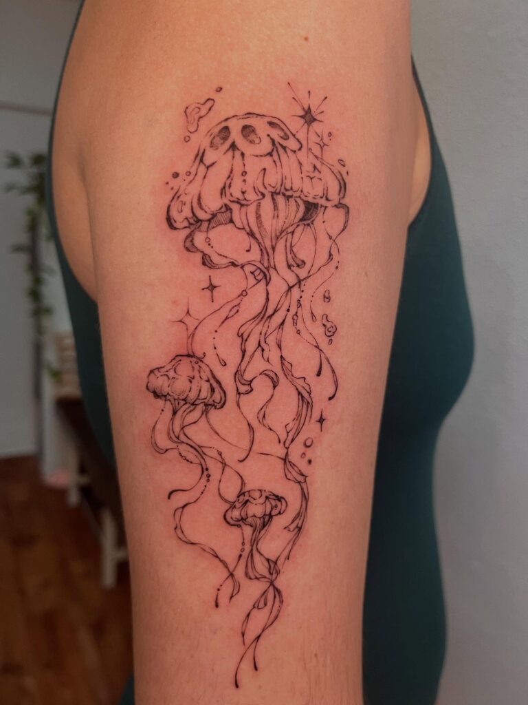 Butterfly And Floral Forearm Tattoo