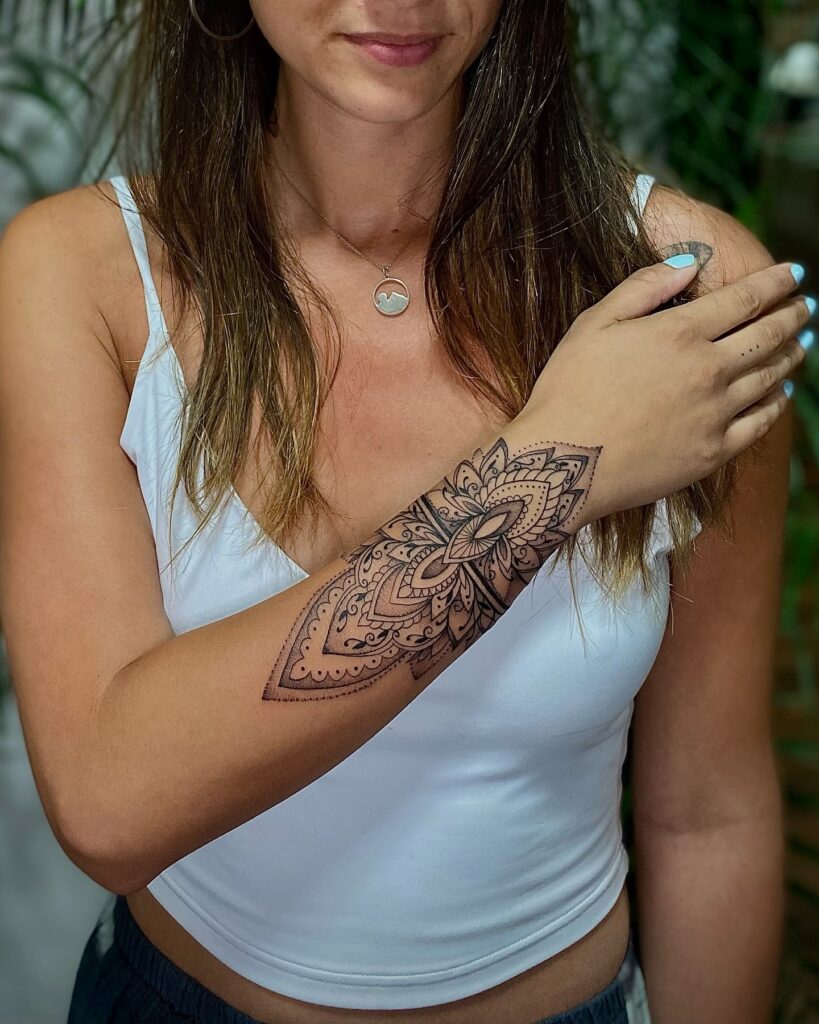 Flowing Mandala Forearm Tattoo mandala wrist tattoo ideas tattoo