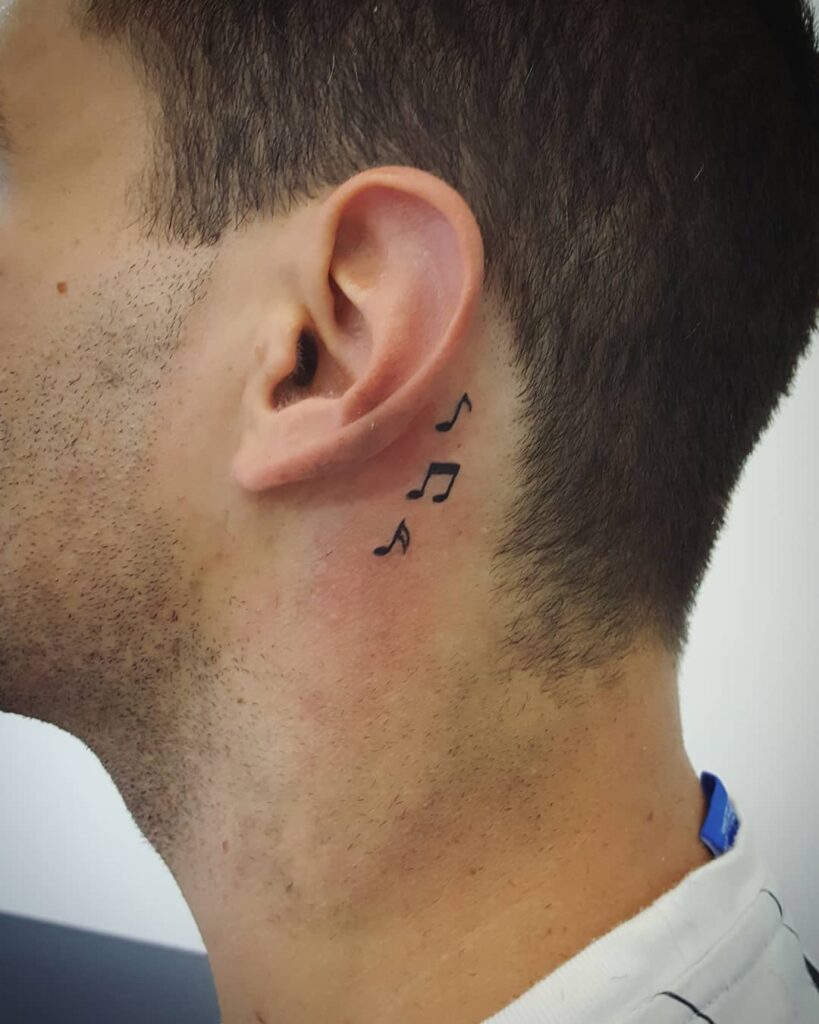 Elegant Feather Behind the Ear behind the ear tattoo ideas for men tattoo
