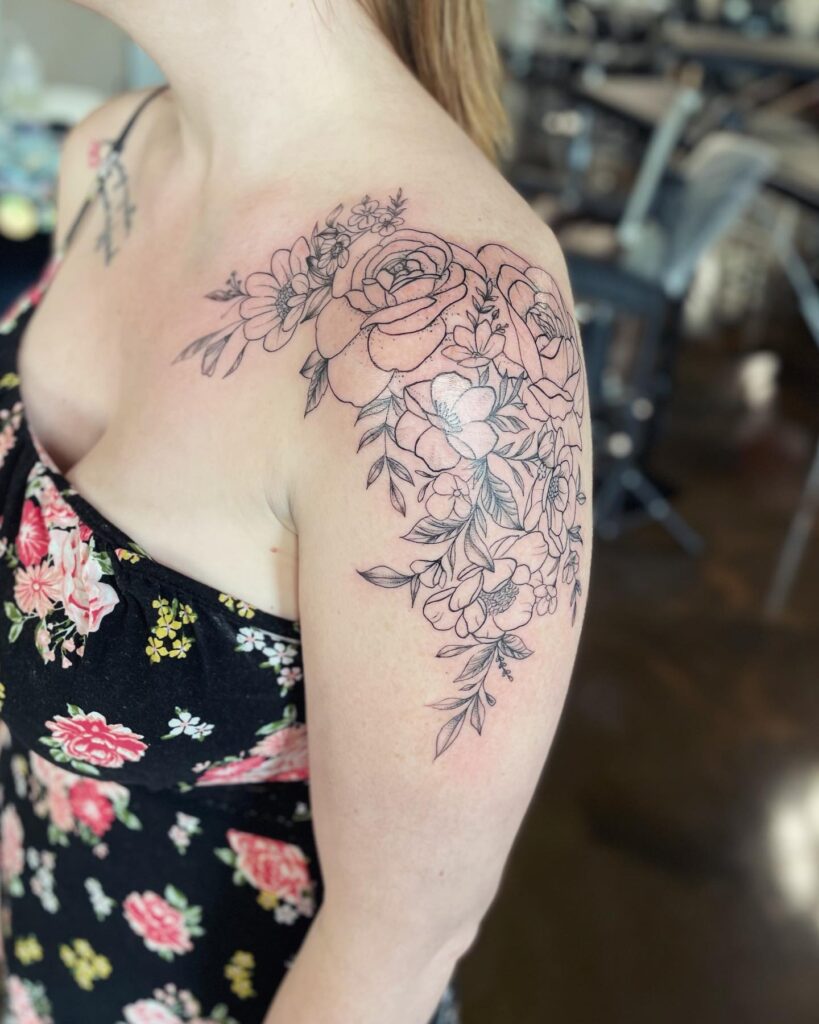 Flowing Shoulder Floral Arrangement Tattoo women shoulder flower tattoo ideas tattoo