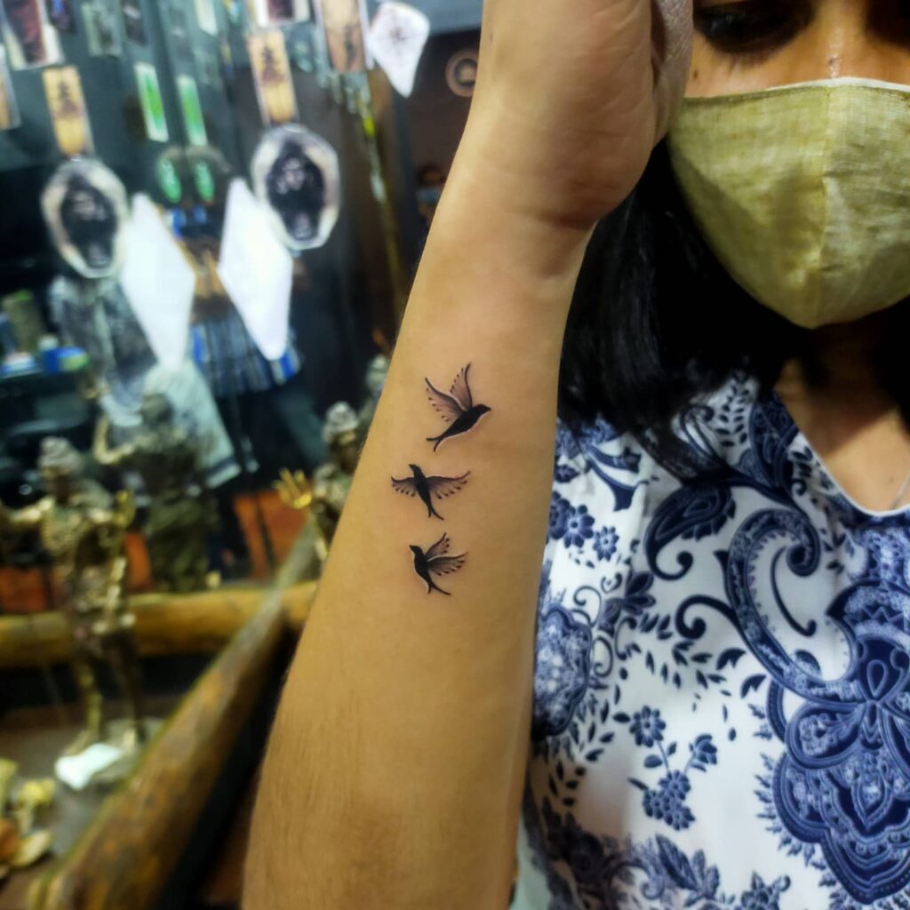 Floating Flower And Ripple Wrist Tattoo