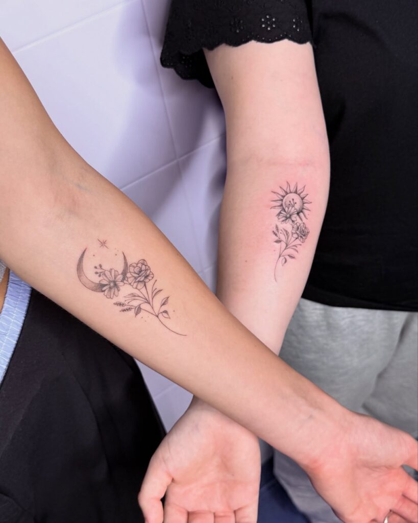 Floral sun and moon forearm tattoos