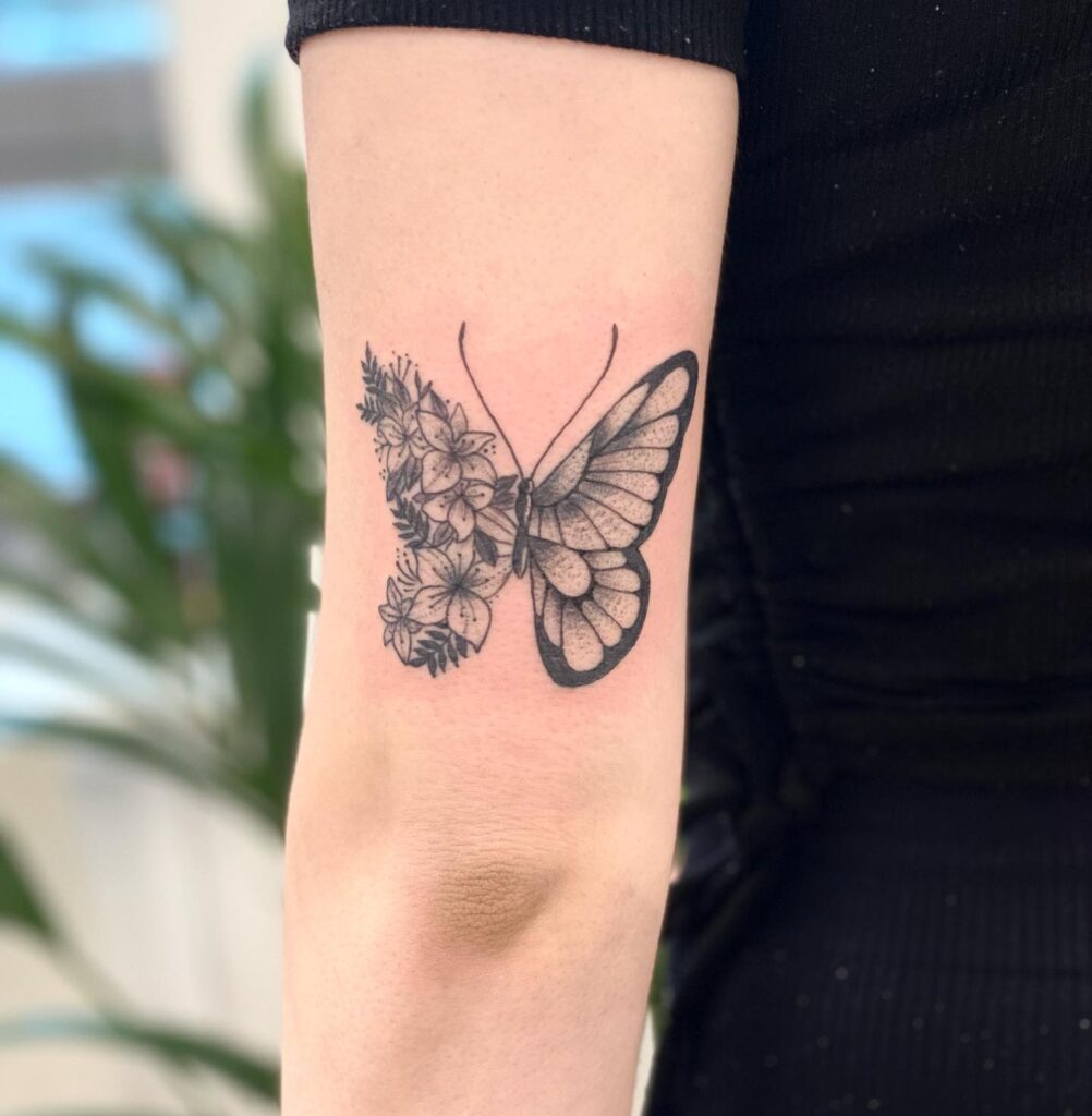 Forearm Butterfly and Lily Tattoo half butterfly half flower tattoos tattoo