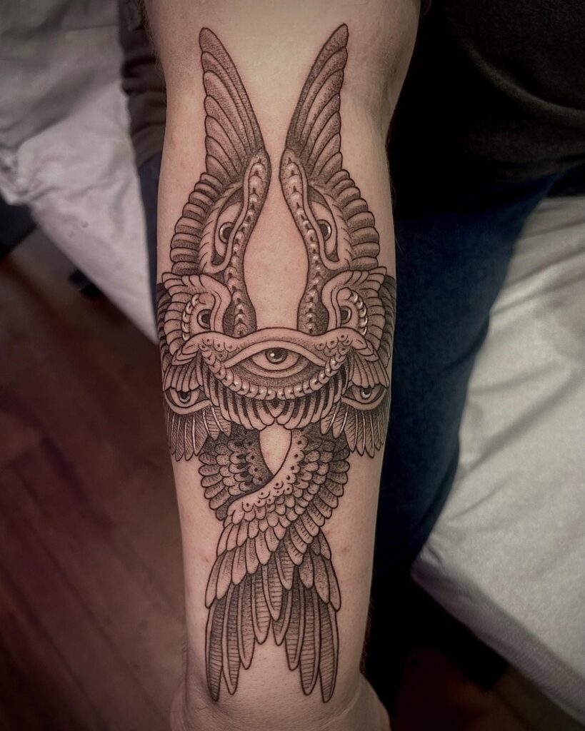 Forearm Seraphim Tattoo with Watchful Eyes and Layered Wings seraphim angel tattoo ideas tattoo