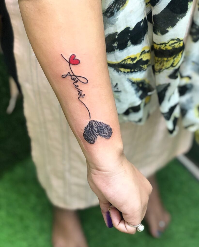 Sun and Moon Fingerprint Heart Tattoo fingerprint tattoos tattoo