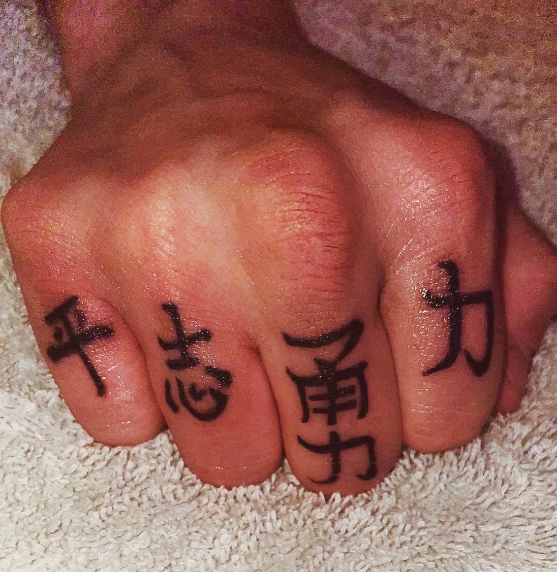 Four Chinese Character Knuckle Tattoo chinese symbols tattoos tattoo