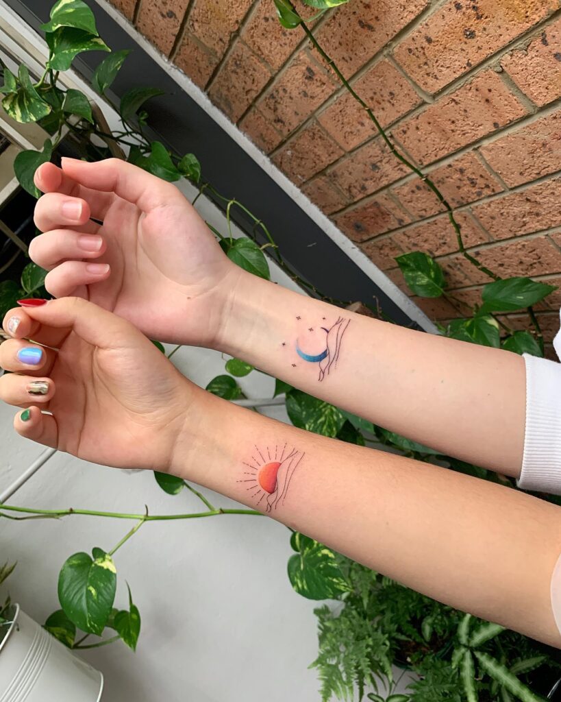 Sun and moon friendship wrist tattoos