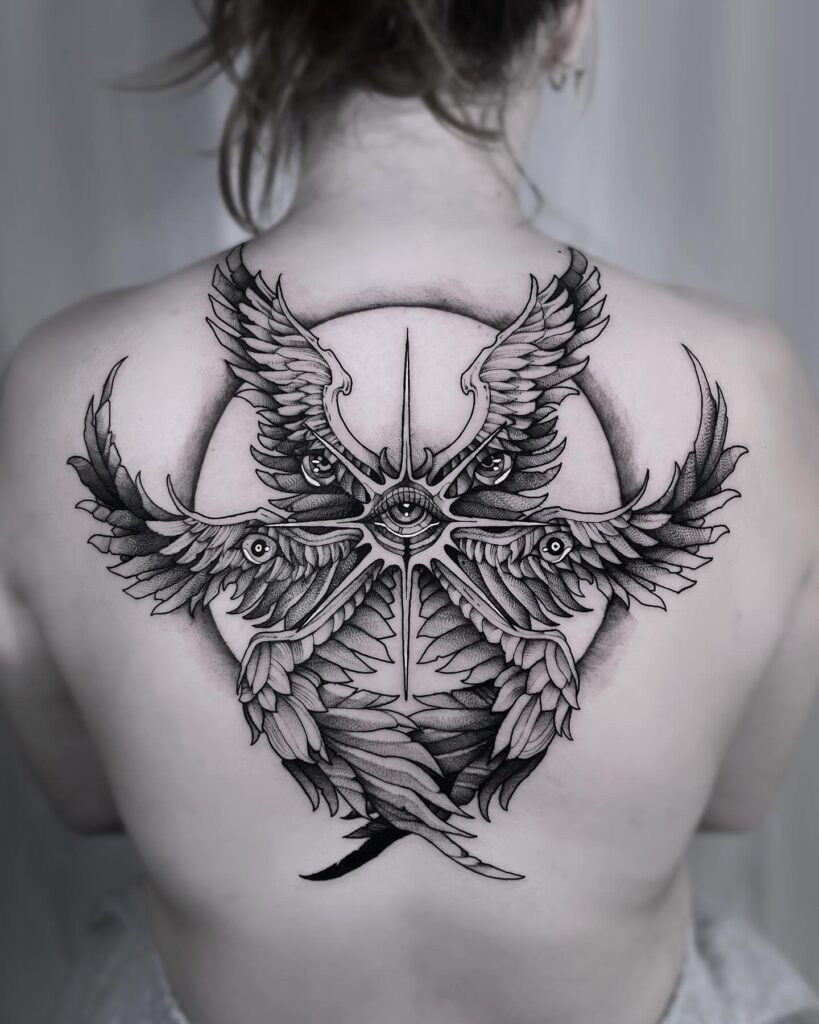 Full Back Seraphim Tattoo with Eyes and Radiant Wings seraphim angel tattoo ideas tattoo