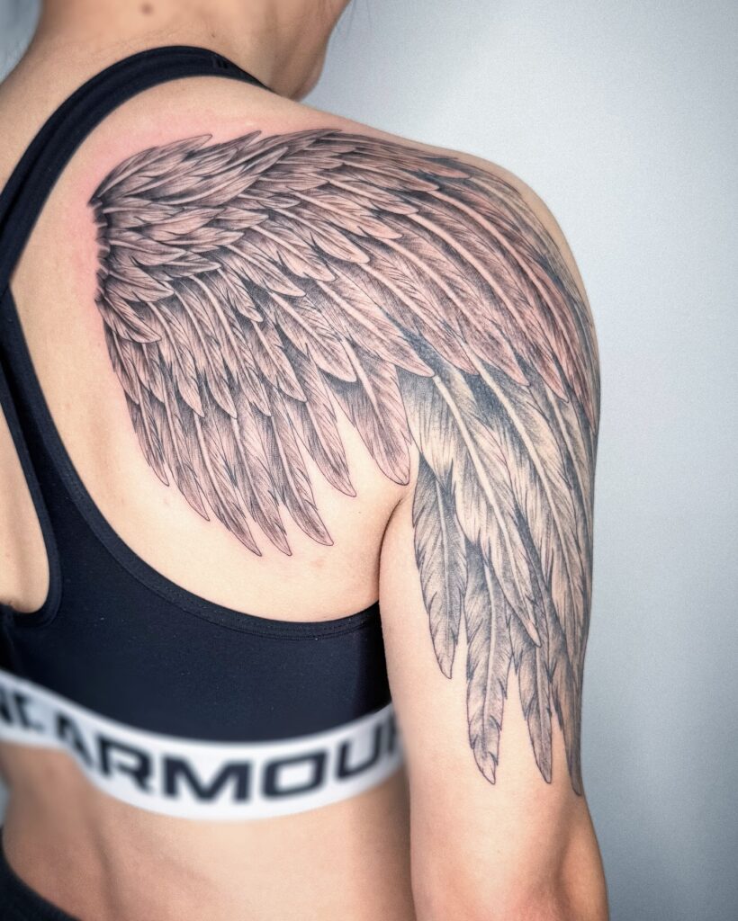 Full Feathered Angel Wing Shoulder Tattoo angel wings tattoo ideas tattoo