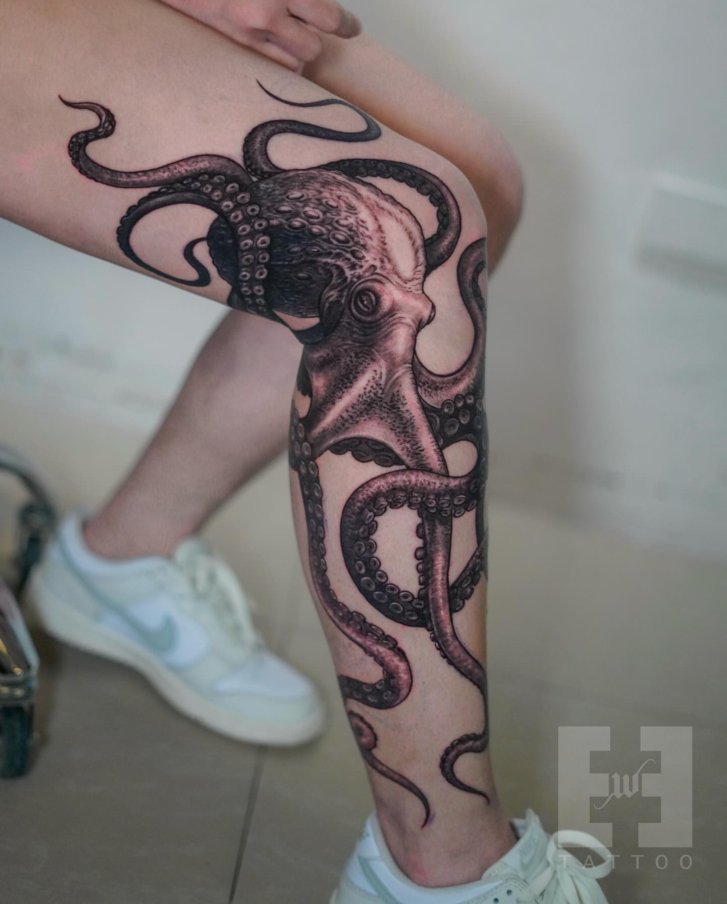 Realistic Octopus Tattoo with Ink Splash Effect octopus tattoos tattoo