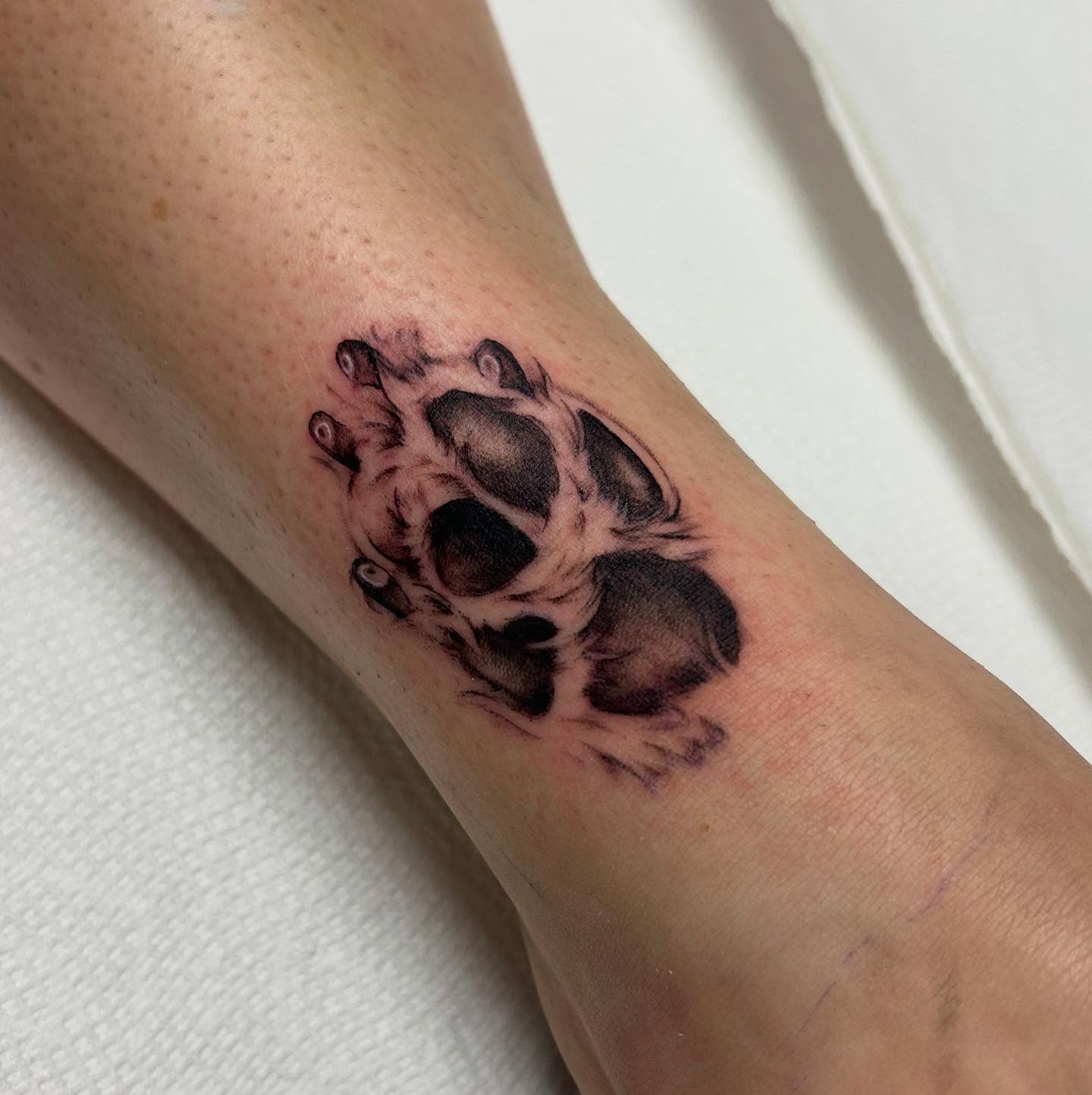 Furry Dog Paw Tattoo With Tiny Claws dog paw tattoos tattoo