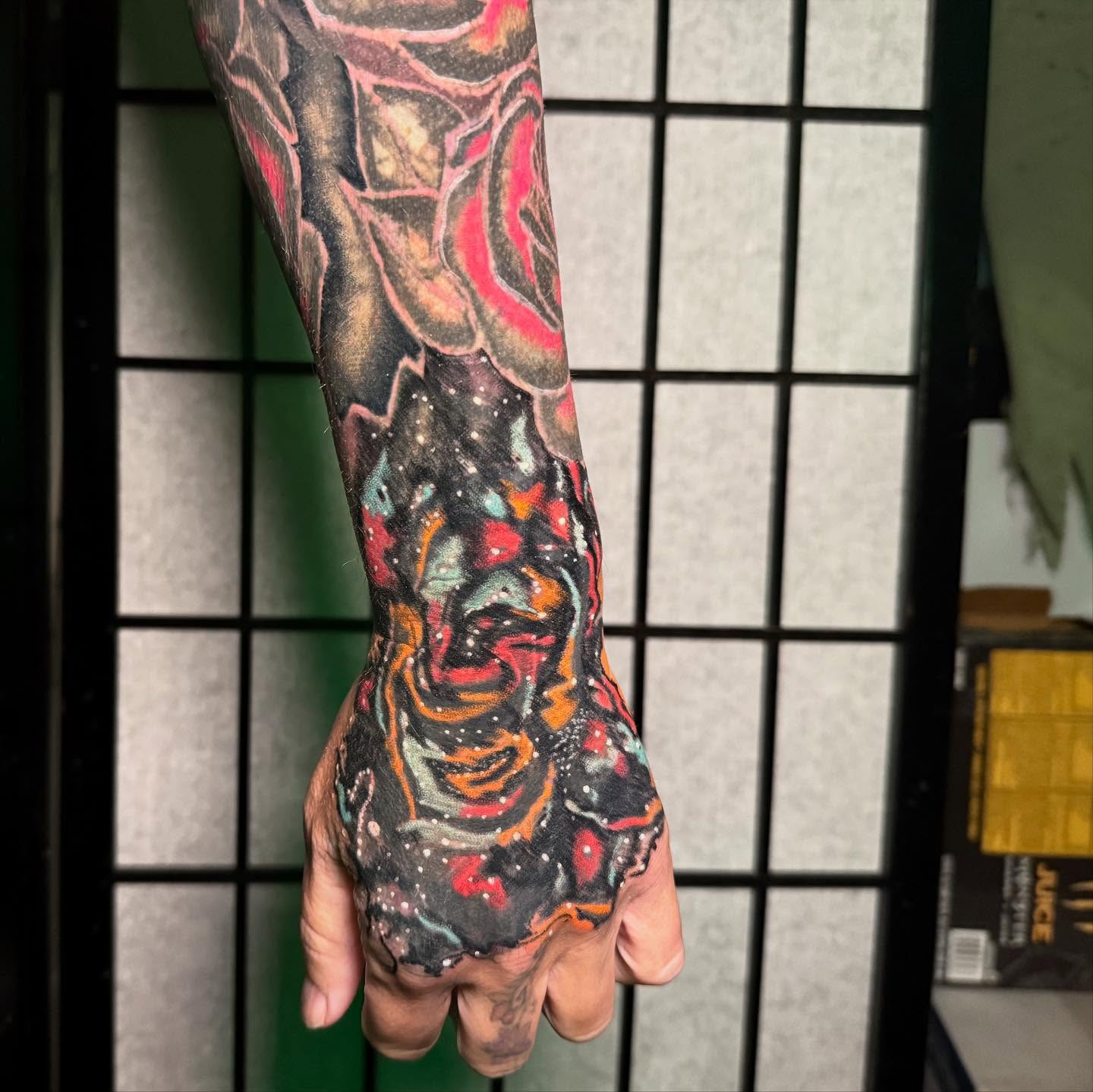 Galaxy Rose Hand Tattoo