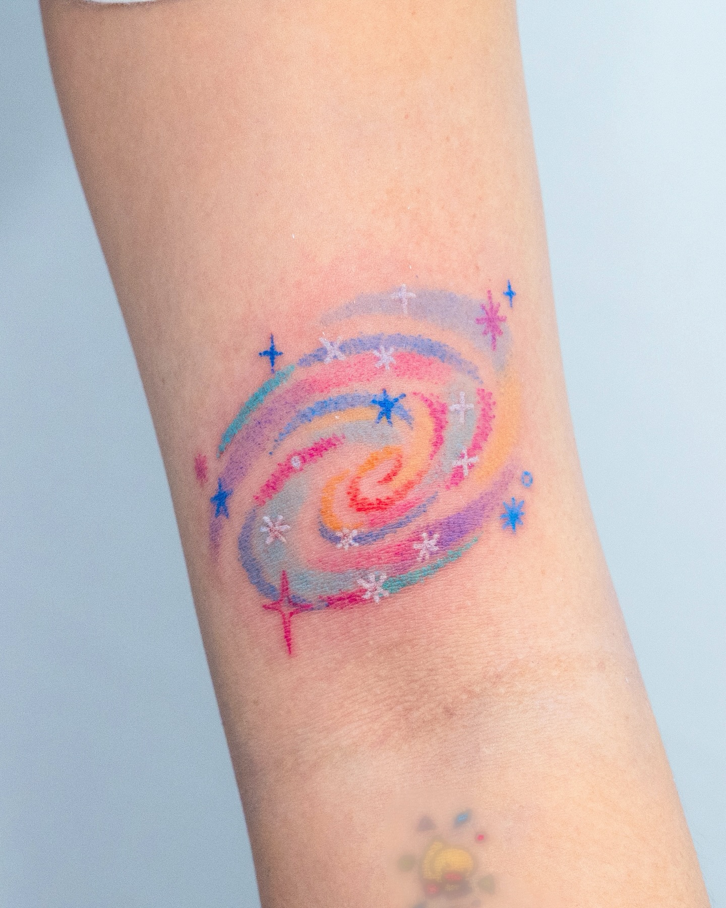 Pastel Spiral Galaxy Tattoo