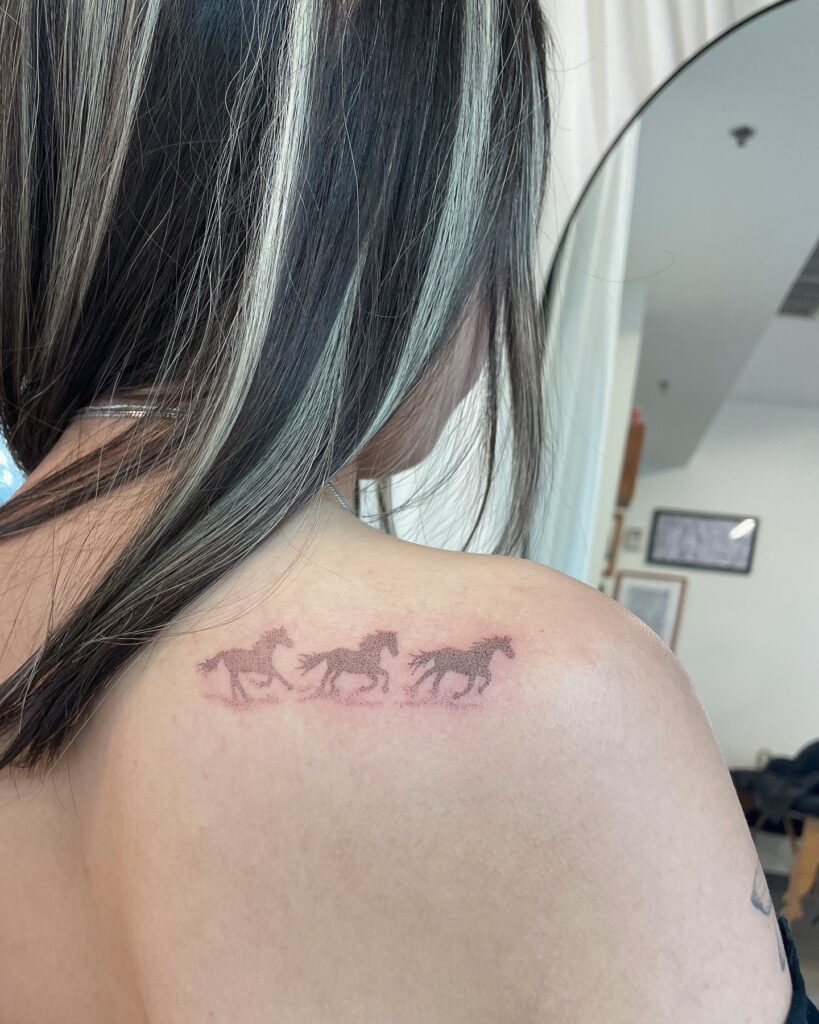 Galloping Horses Silhouette Tattoo