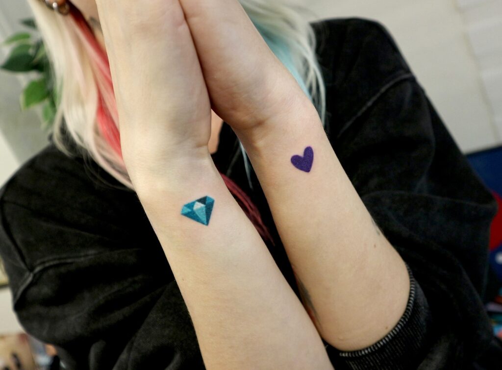 Geometric Starburst Wrist Tattoo