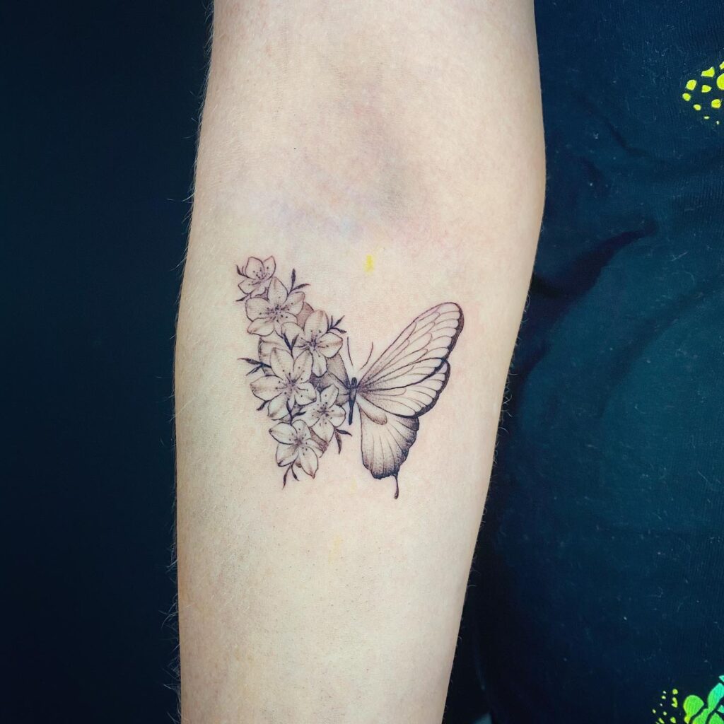 Gentle Bloom and Butterfly Tattoo half butterfly half flower tattoos tattoo
