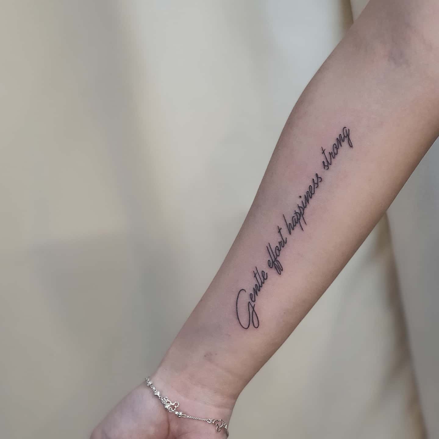 Gentle Giant Happiness Is a Journey Tattoo meaningful word tattoos tattoo