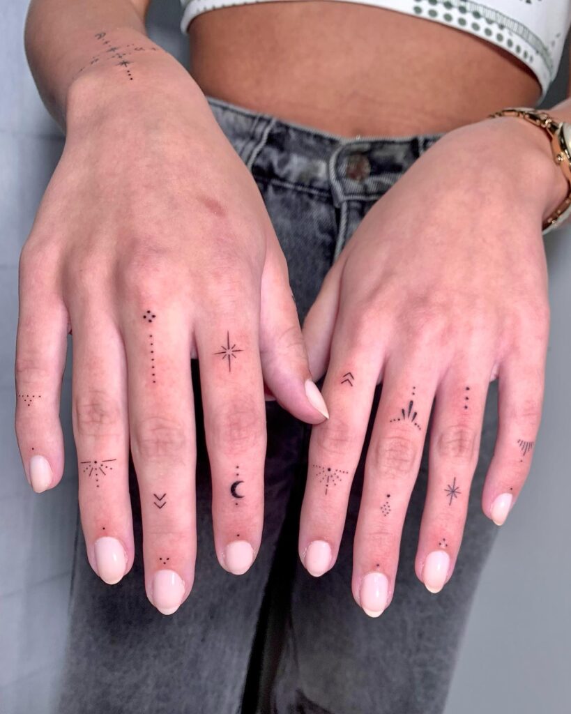 Tiny Sun Finger Tattoo
