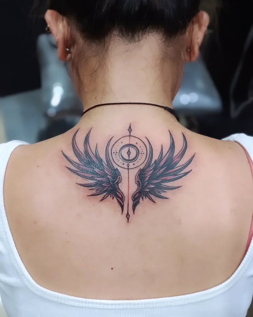 Geometric Angel Wings Tattoo with Cosmic Eye Symbol angel wings tattoo ideas on back tattoo