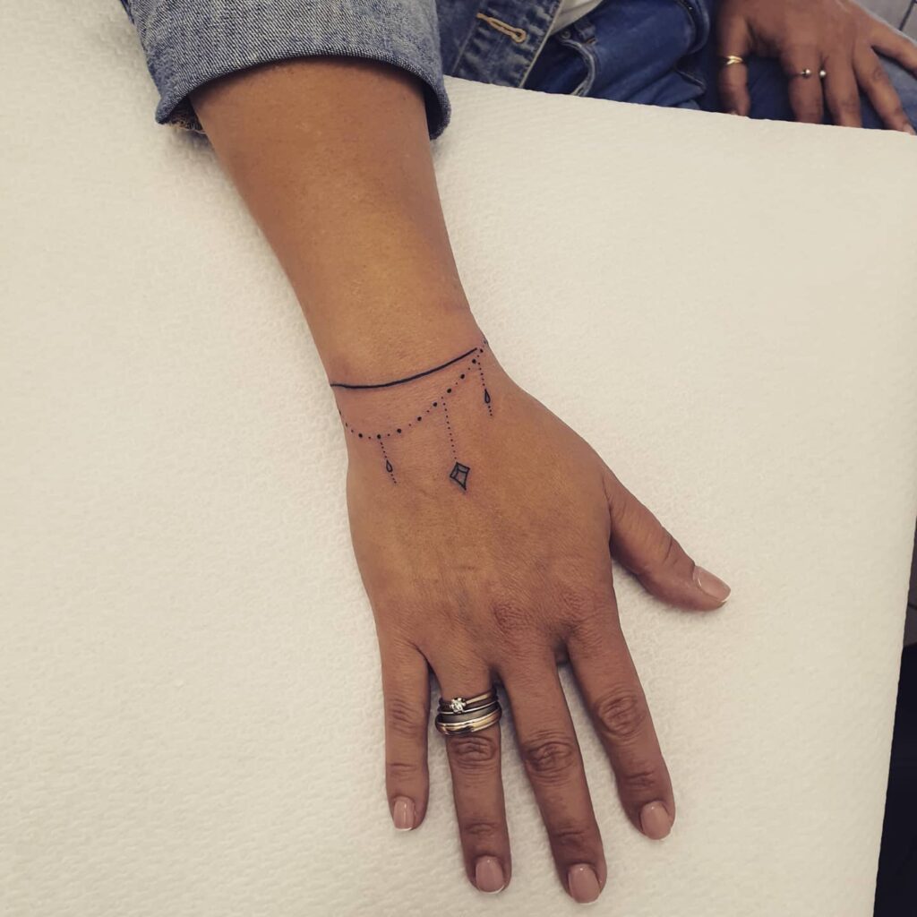 Red String Bracelet Tattoo