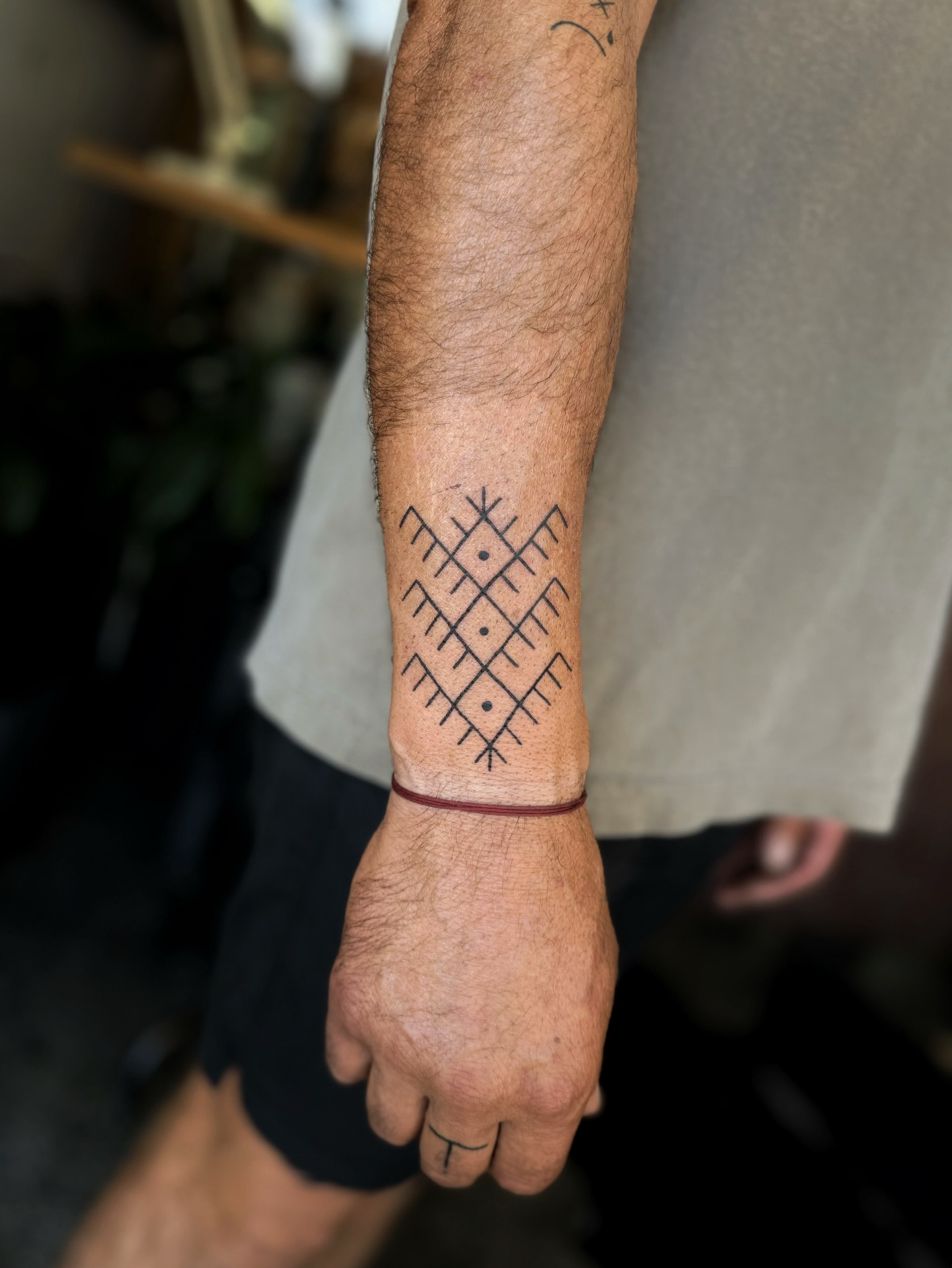 Geometric Diamond Pattern Wrist Tattoo