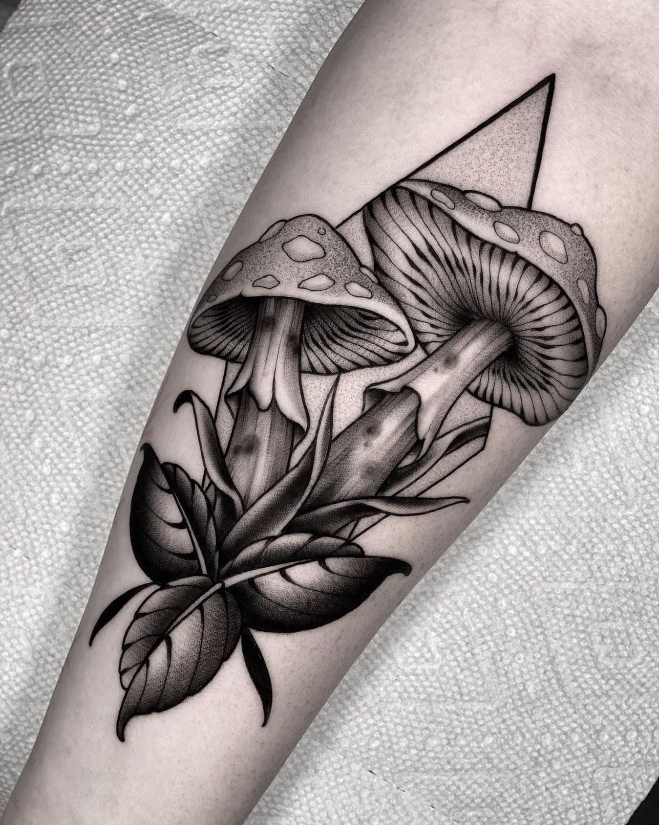 Mushroom and Snail Tattoo with Fern Leaves mushroom tattoo ideas tattoo