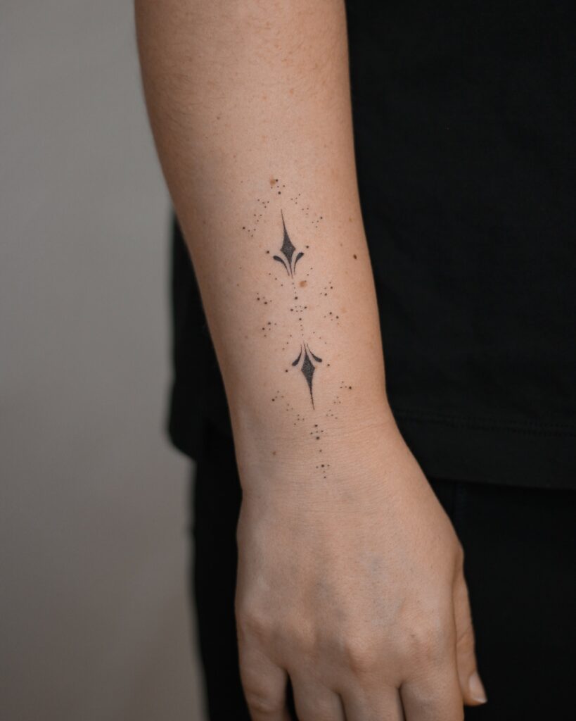 Minimalist Botanical Balance Stick And Poke Tattoo